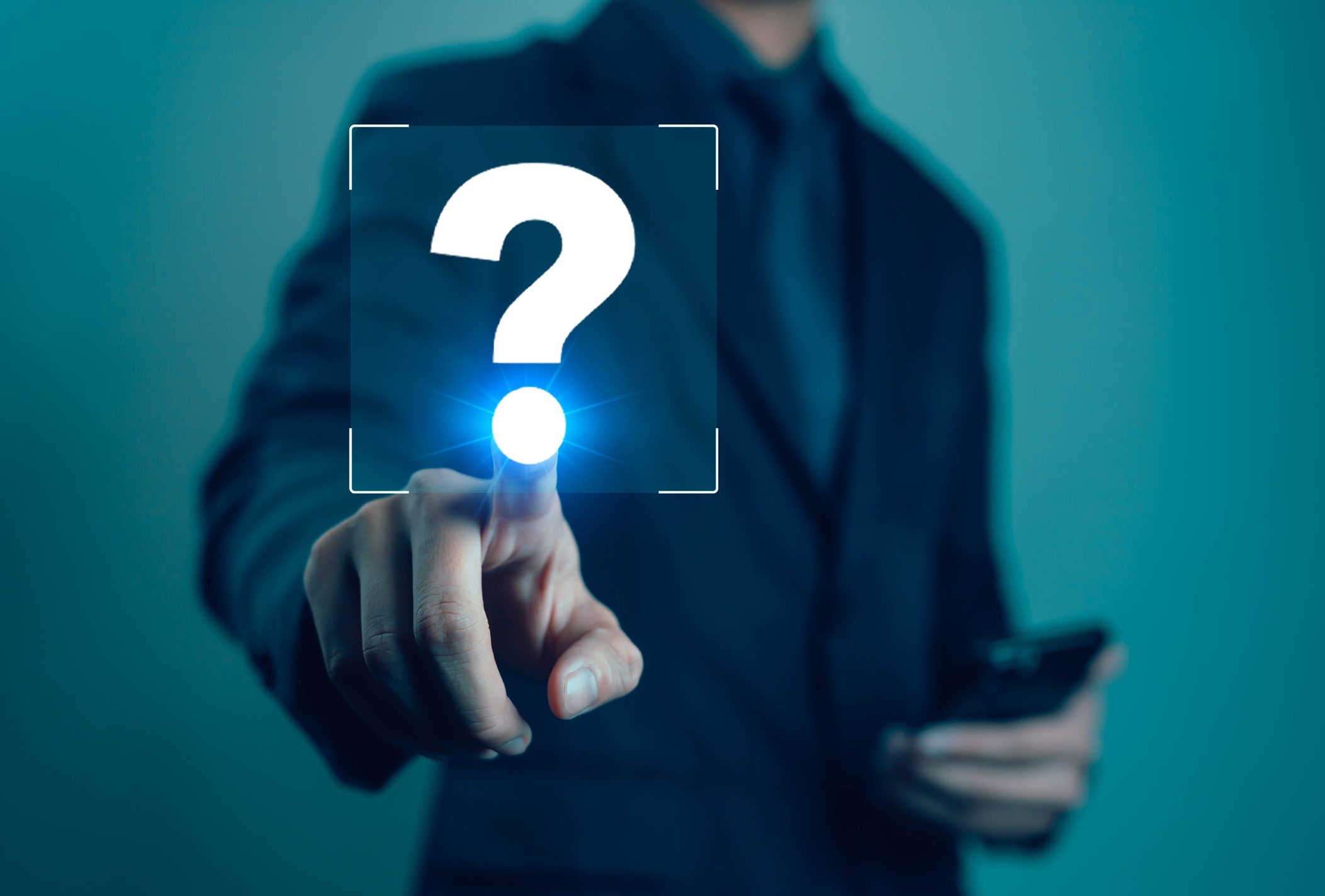 Person selecting question icon on touchscreen