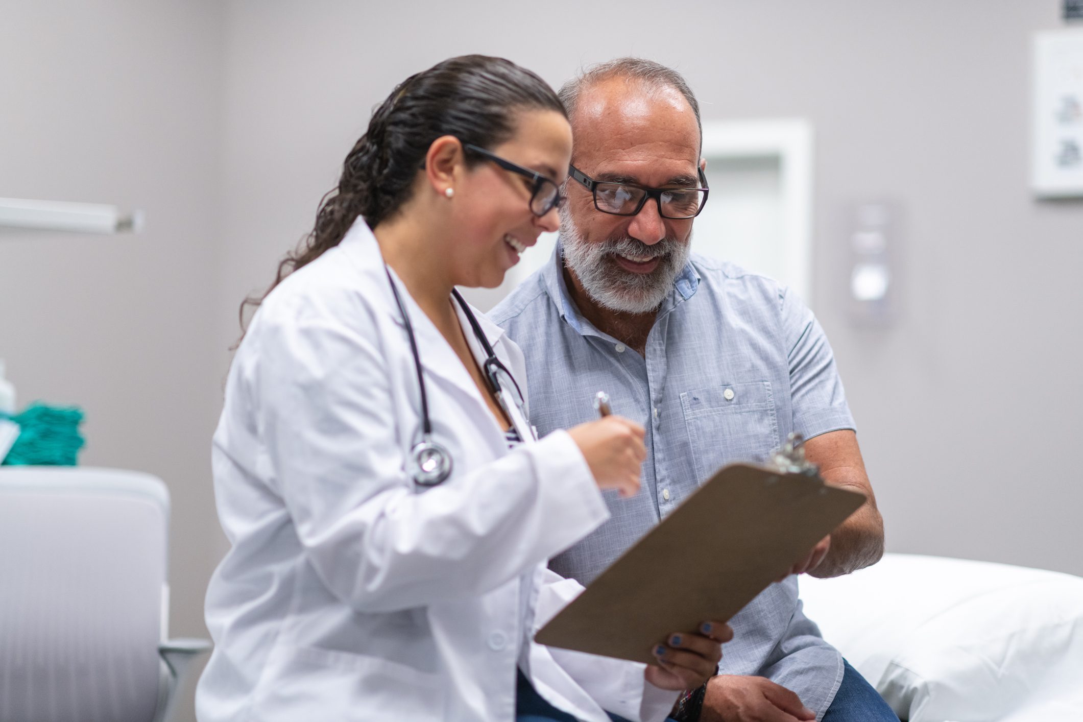 Healthcare professional discussing with patient