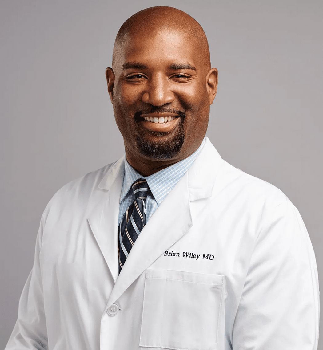 Smiling doctor in a white coat